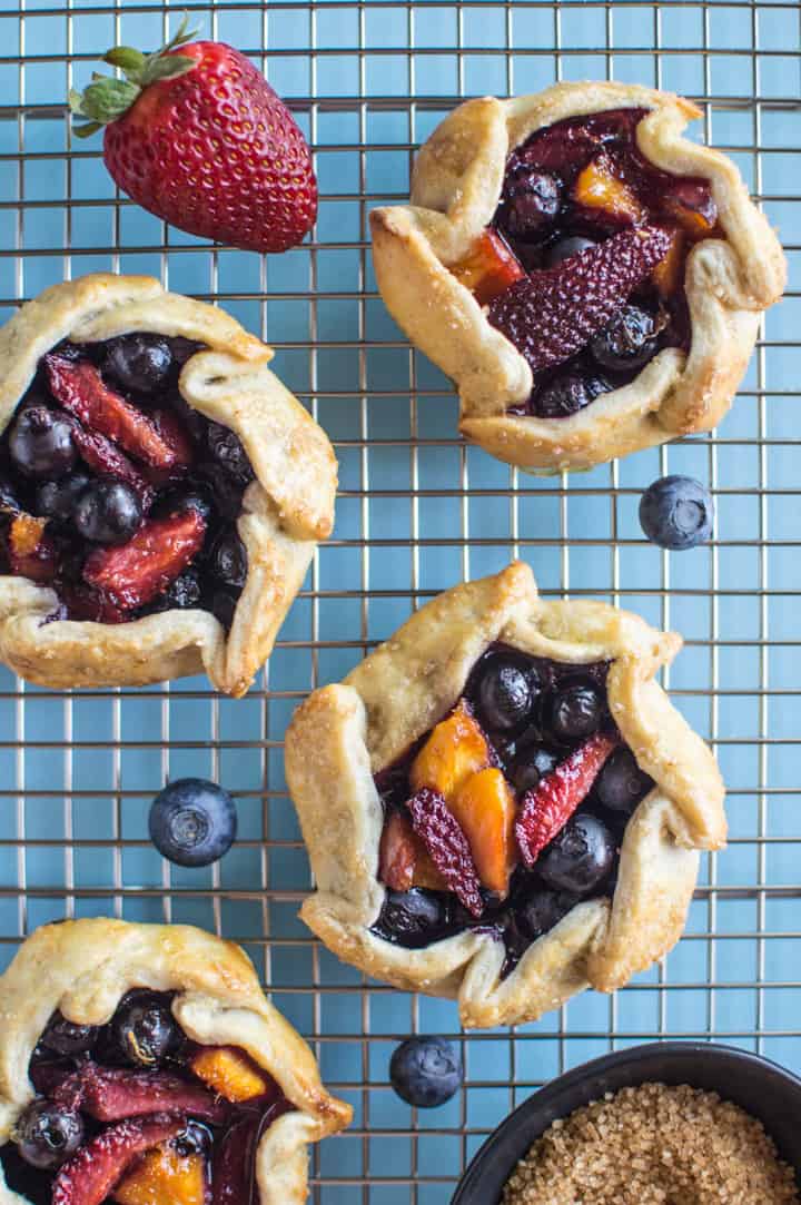 Mini Berry and Peach Galettes - the perfect summer treat! | healthynibblesandbist.com