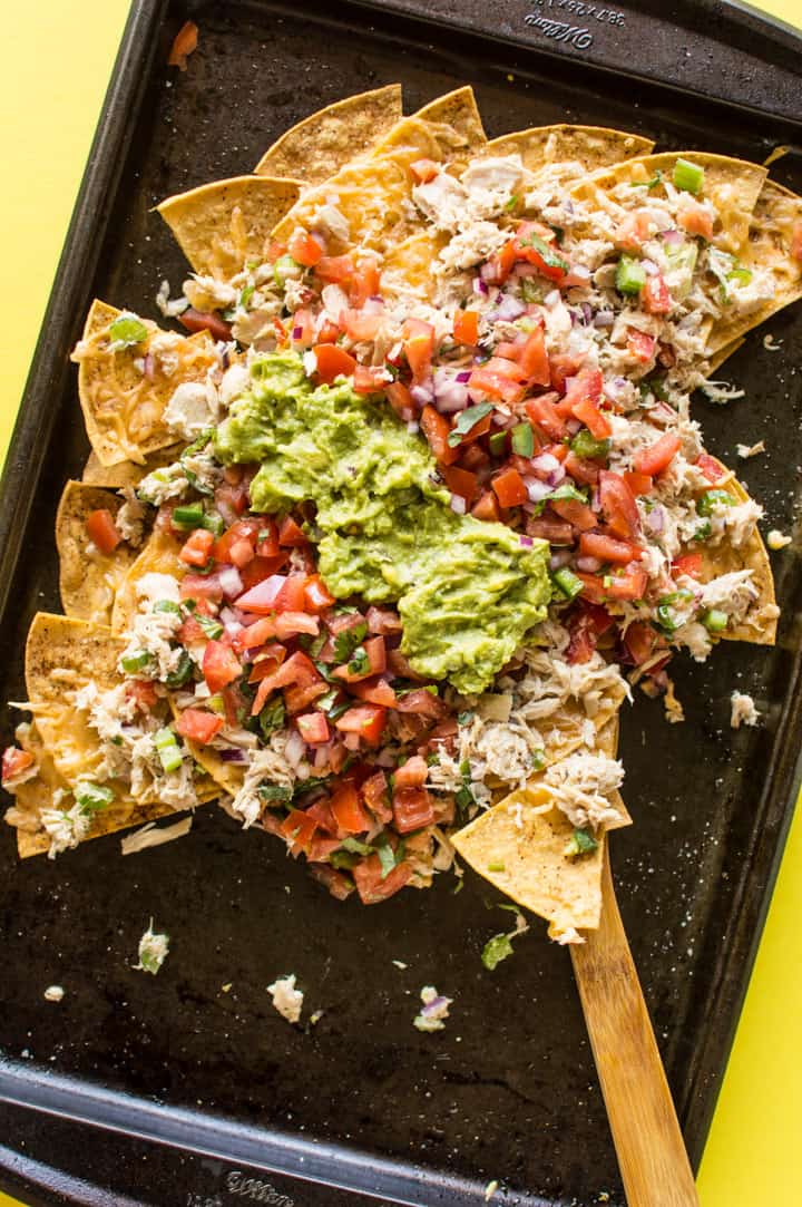 Asian Tuna Melt Nachos - a delicious no-mayo tuna salad atop crunchy homemade tortilla chips. An easy, healthy 30-minute appetizer! | healthynibblesandbits.com