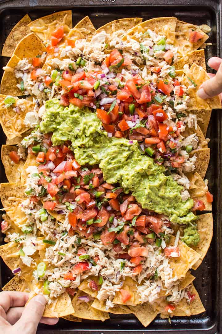 Asian Tuna Melt Nachos - a delicious no-mayo tuna salad atop crunchy homemade tortilla chips. An easy, healthy 30-minute appetizer! | healthynibblesandbits.com