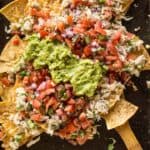 Asian Tuna Melt Nachos - a delicious no-mayo tuna salad atop crunchy homemade tortilla chips. An easy, healthy 30-minute appetizer! | healthynibblesandbits.com