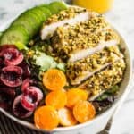 Pistachio Crusted Chicken Salad with Carrot Ginger Dressing - this gluten-free and paleo salad is perfect for weeknights. Ready in 30 minutes! | healthynibblesandbits.com