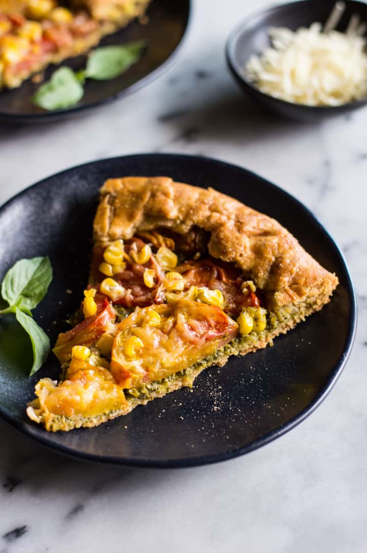 Gluten-Free Heirloom Tomato Galette with Kale Pesto - a delicious savory galette with a flaky gluten-free crust! | healthynibblesandbits.com