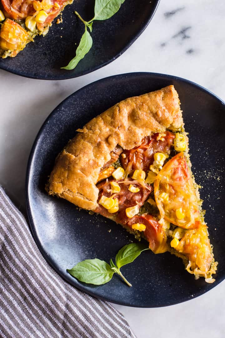 Gluten-Free Heirloom Tomato Galette with Kale Pesto - a delicious savory galette with a flaky gluten-free crust! | healthynibblesandbits.com