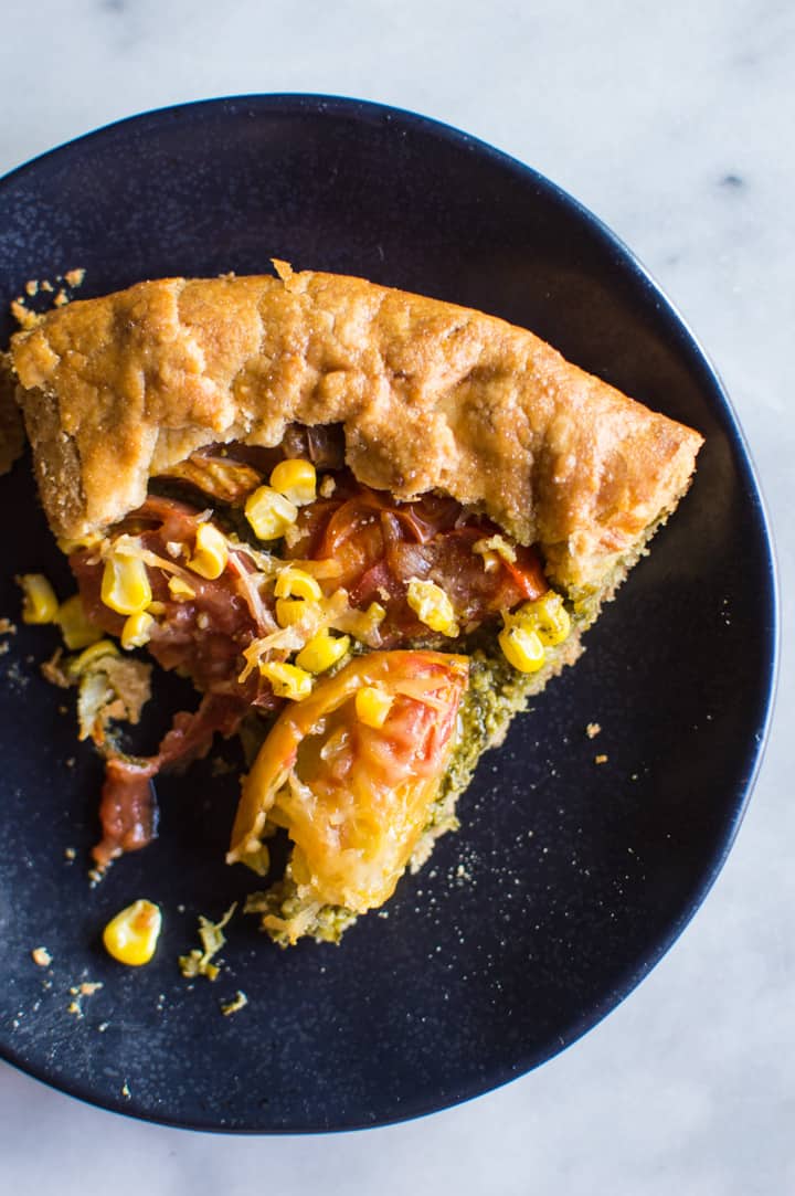 Gluten-Free Heirloom Tomato Galette with Kale Pesto - a delicious savory galette with a flaky gluten-free crust! | healthynibblesandbits.com