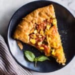 Gluten-Free Heirloom Tomato Galette with Kale Pesto - a delicious savory galette with a flaky gluten-free crust! | healthynibblesandbits.com