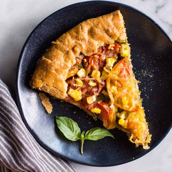 Gluten-Free Heirloom Tomato Galette with Kale Pesto - a delicious savory galette with a flaky gluten-free crust! | healthynibblesandbits.com