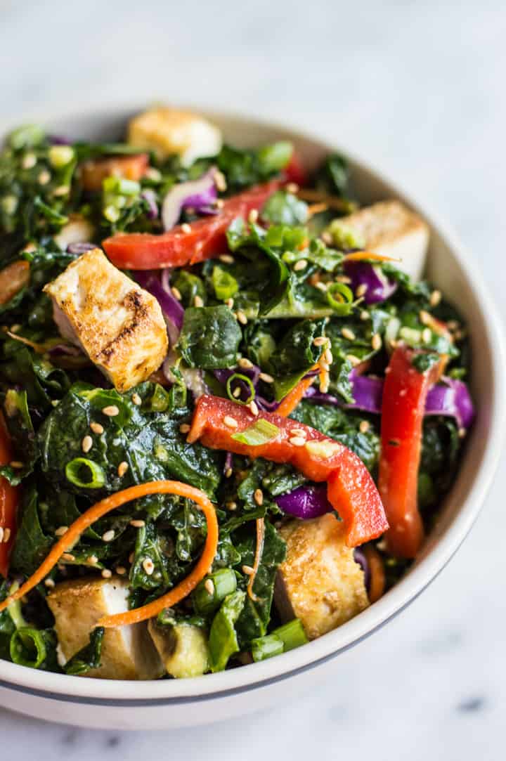 Kale Salad with Fried Tofu and Miso Ginger Dressing - an easy vegan salad with asian flavors | healthynibblesandbits.com