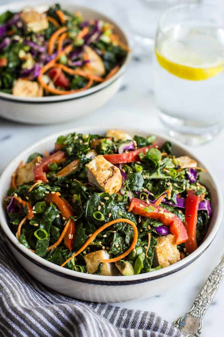 Kale Salad with Fried Tofu and Miso Ginger Dressing - an easy vegan salad with asian flavors | healthynibblesandbits.com