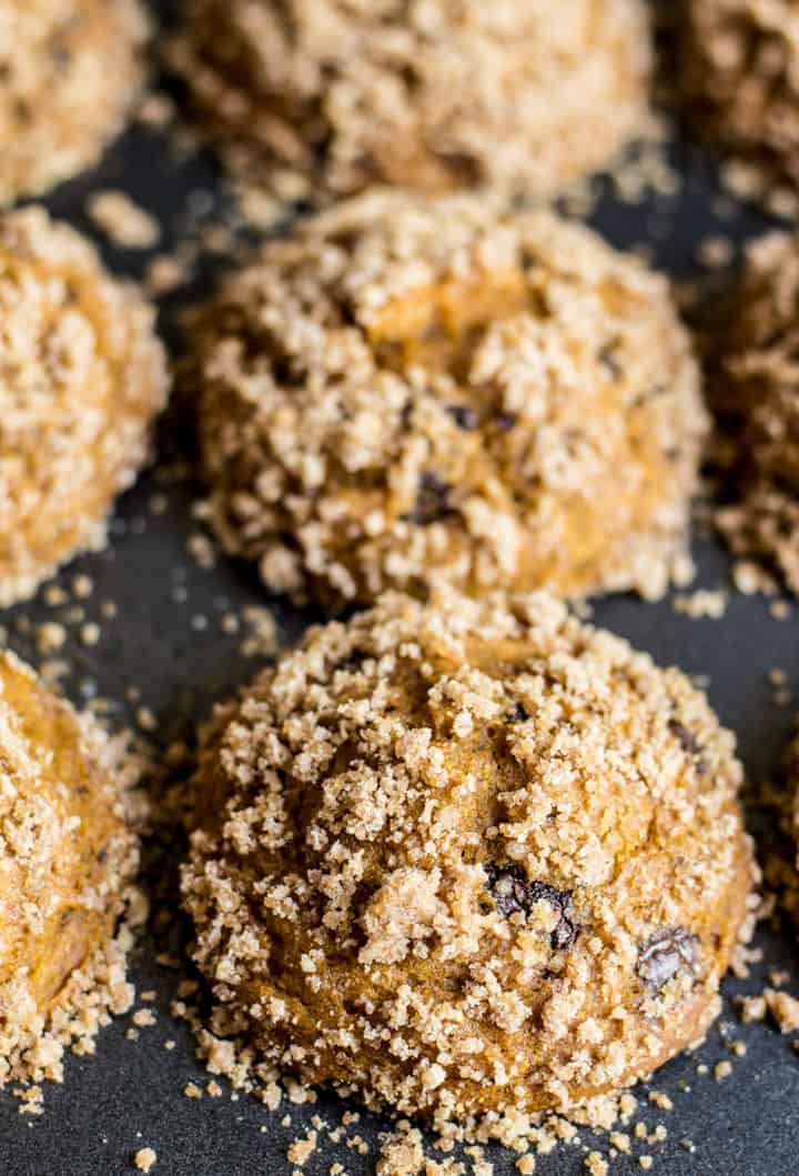 Gluten-Free Pumpkin Crumb Muffins with Chocolate - super moist muffins with a crunchy top crumble on top! | healthynibblesandbits.com