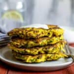 8-Ingredient Turmeric Zucchini and Potato Fritters - easy gluten-free sides that are perfect for any meal! | healthynibblesandbits.com