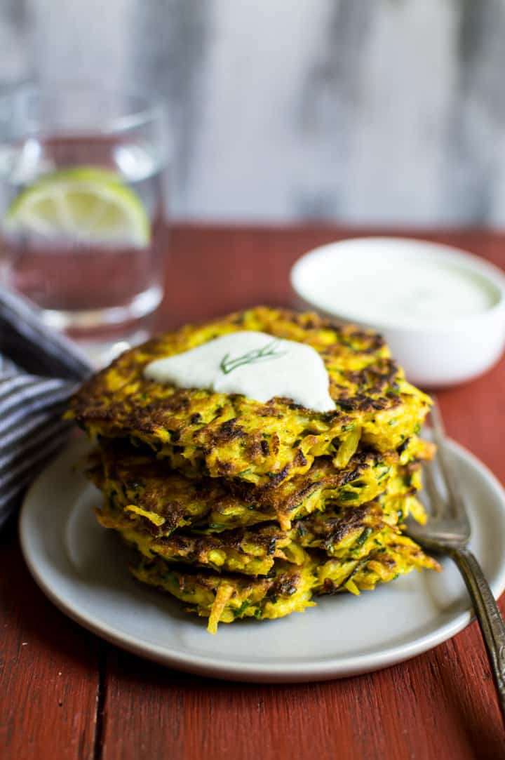 8-Ingredient Turmeric Zucchini and Potato Fritters - easy gluten-free sides that are perfect for any meal! | healthynibblesandbits.com