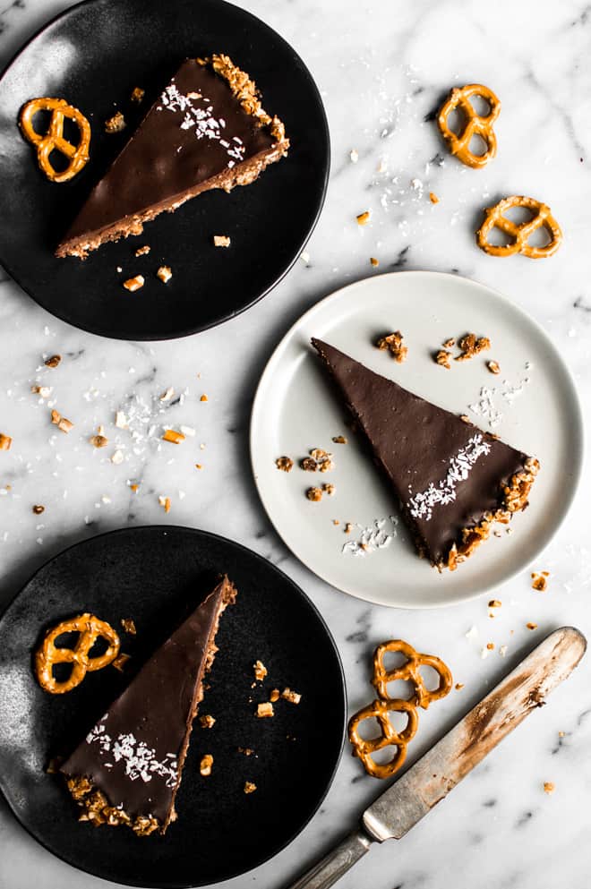 Five-Ingredient Chocolate Coconut Tart with Pretzel Crust - this rich gluten-free dessert is a must make for your next gathering! by Lisa Lin of Healthy Nibbles & Bits