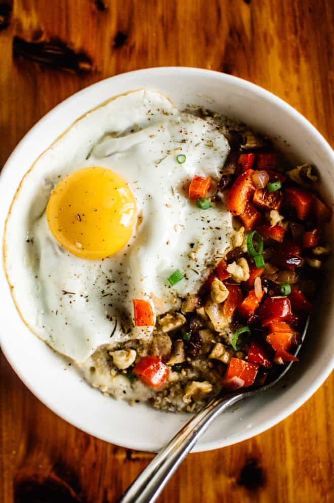 Savory Oatmeal with Cheddar and Fried Egg - perfect breakfast bowl ready in 10 minutes! by Lisa Lin of healthynibblesandbits.com