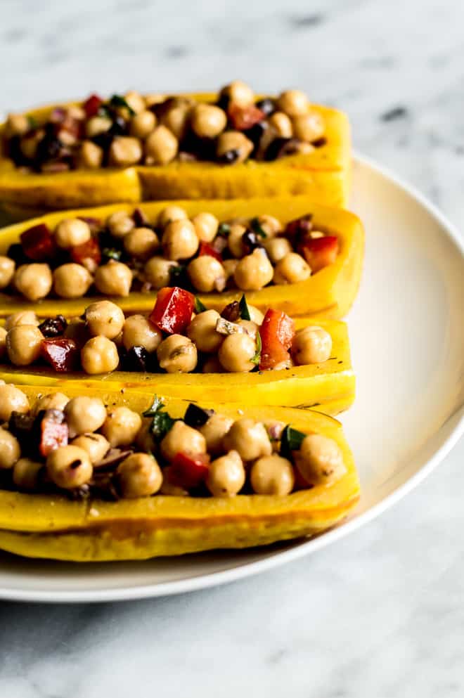 Mediterranean Chickpea Salad Stuffed Squash - an easy gluten free and weeknight meal from Lisa Lin of healthynibblesandbits.com