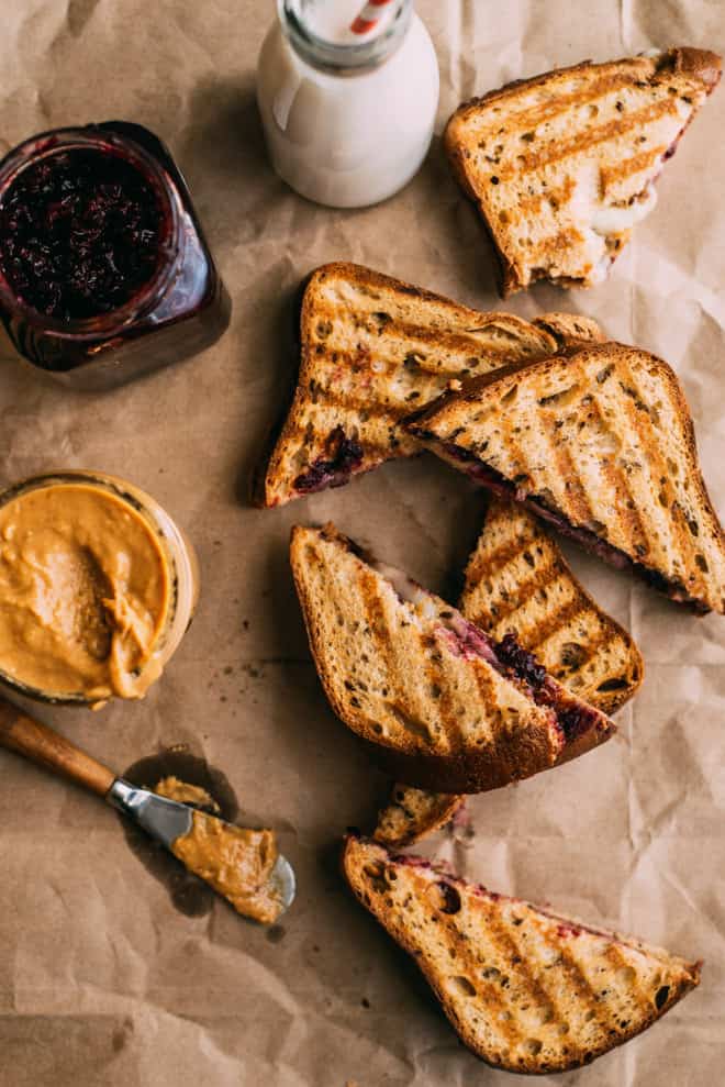 Grilled Peanut Butter and Jelly Sandwich with Brie Cheese - this is the ULTIMATE comfort food! Ready with just 5 ingredients! by Lisa Lin of healthynibblesandbits.com
