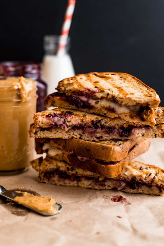 Grilled Peanut Butter and Jelly Sandwich with Brie Cheese - this is the ULTIMATE comfort food! Ready with just 5 ingredients! by Lisa Lin of healthynibblesandbits.com