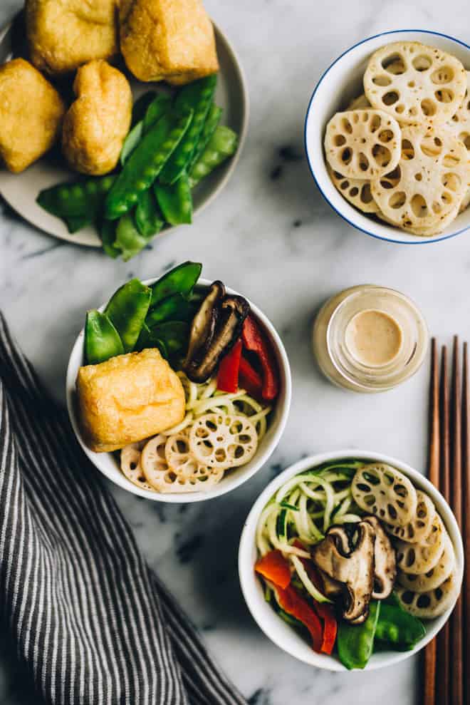 Zucchini Noodle (Zoodles) Bowl with Peanut Coconut Sauce - this dreamy vegan and gluten-free bowl is ready in 30 minutes! by Lisa Lin of healthynibblesandbits.com