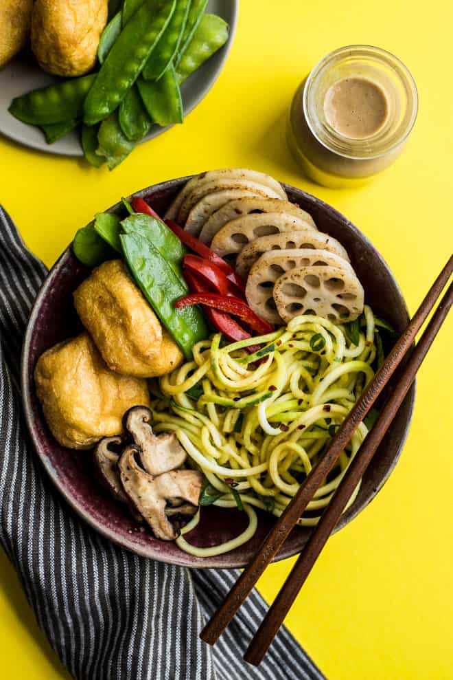 Zucchini Noodle Bowl ("Zoodles") with Peanut Coconut Sauce - this dreamy vegan and gluten-free bowl is ready in 30 minutes! by Lisa Lin of healthynibblesandbits.com