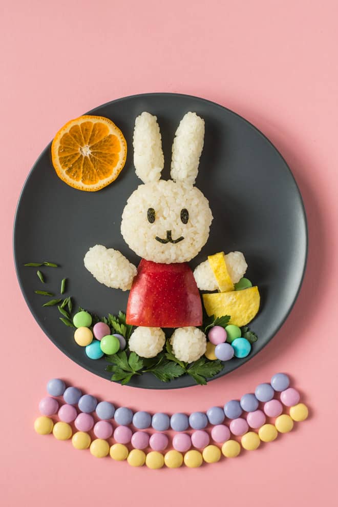 Easy Easter Bunny Food Art - made with rice, an apple, sushi seaweed, parsley, an egg, and M&M's! by @healthynibs