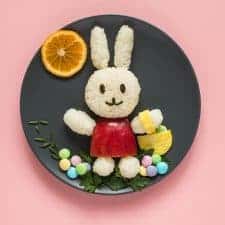 Easy Easter Bunny Food Art - made with rice, an apple, sushi seaweed, parsley, an egg, and M&M's! by @healthynibs
