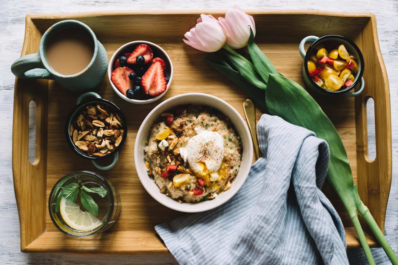 Savory Oatmeal with Poached Egg and Roasted Almonds - easy, filling and healthy breakfast to jump-start your day. 