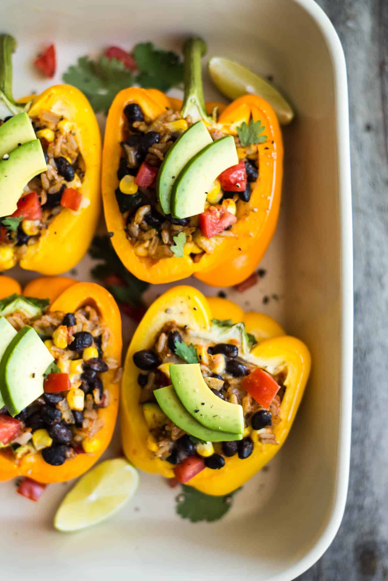 Beans and Rice Stuffed Peppers - a healthy, gluten-free dinner that is ready in 45 minutes. (409 calories per serving) by @healthynibs