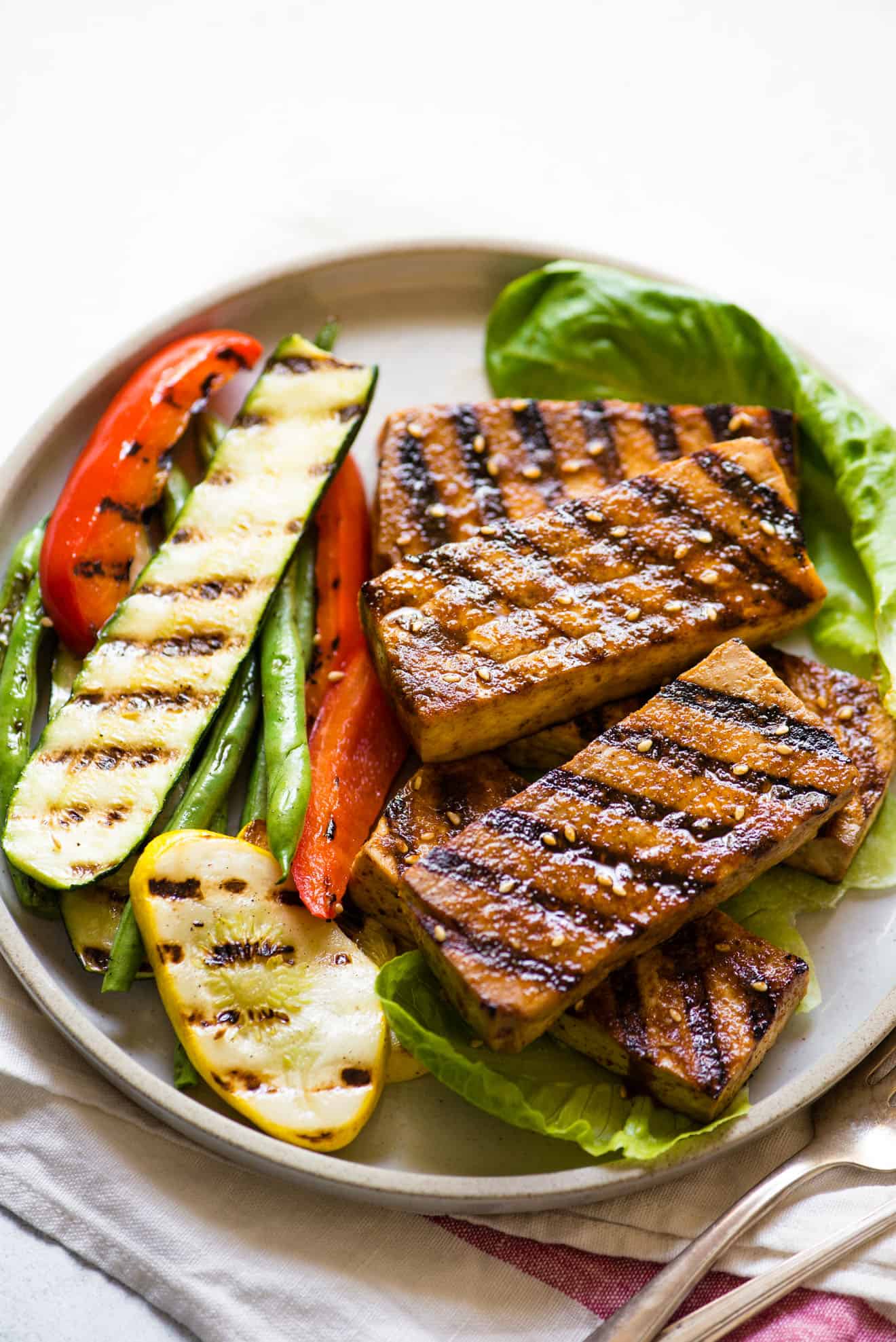 EASY & HEALTHY grilled tofu seasoned with a cajun-spiced marinade! Perfect for weeknight meals or BBQs!