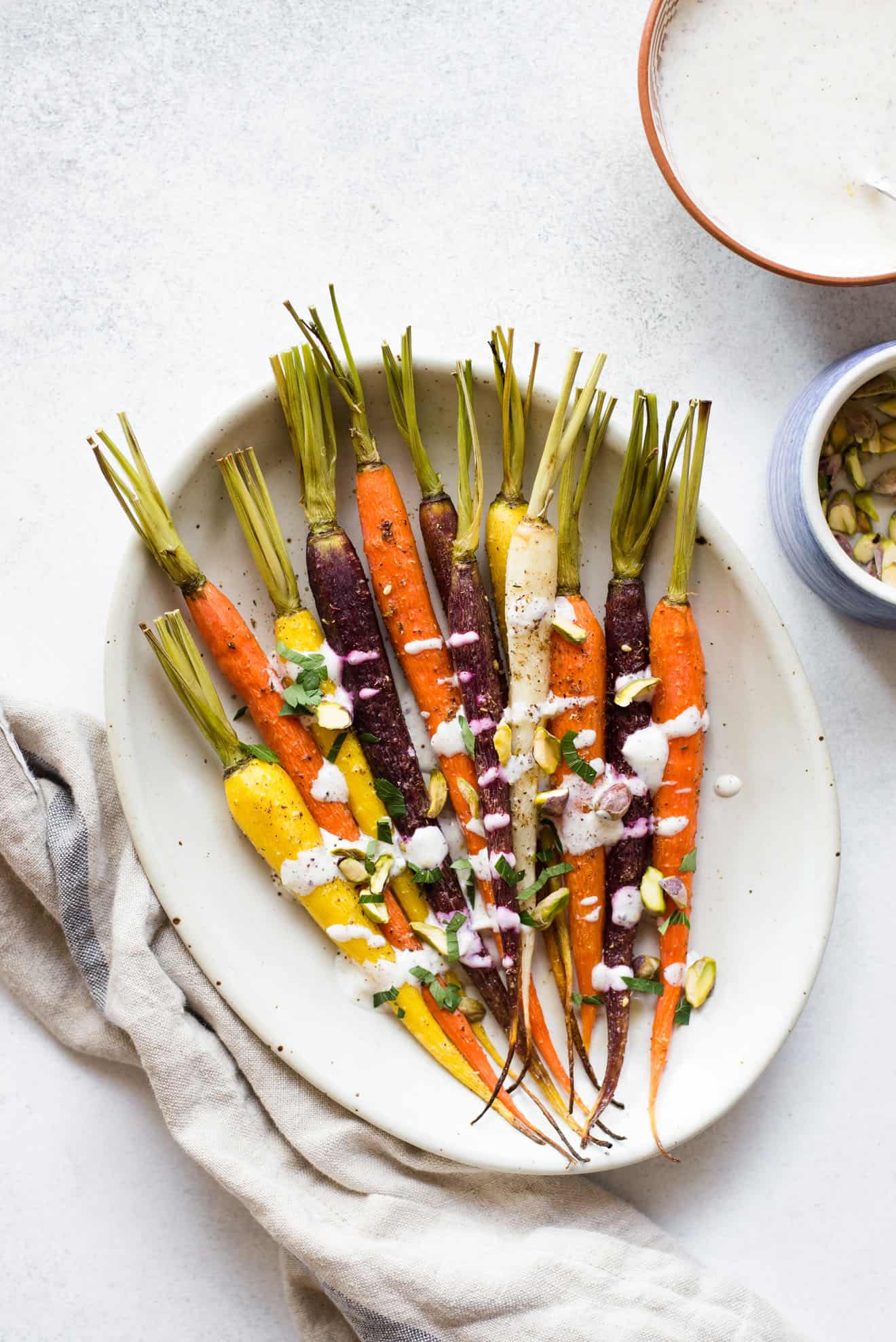 Za'atar Roasted Carrots with Sumac Yogurt Sauce - an easy and healthy holiday side dish! 