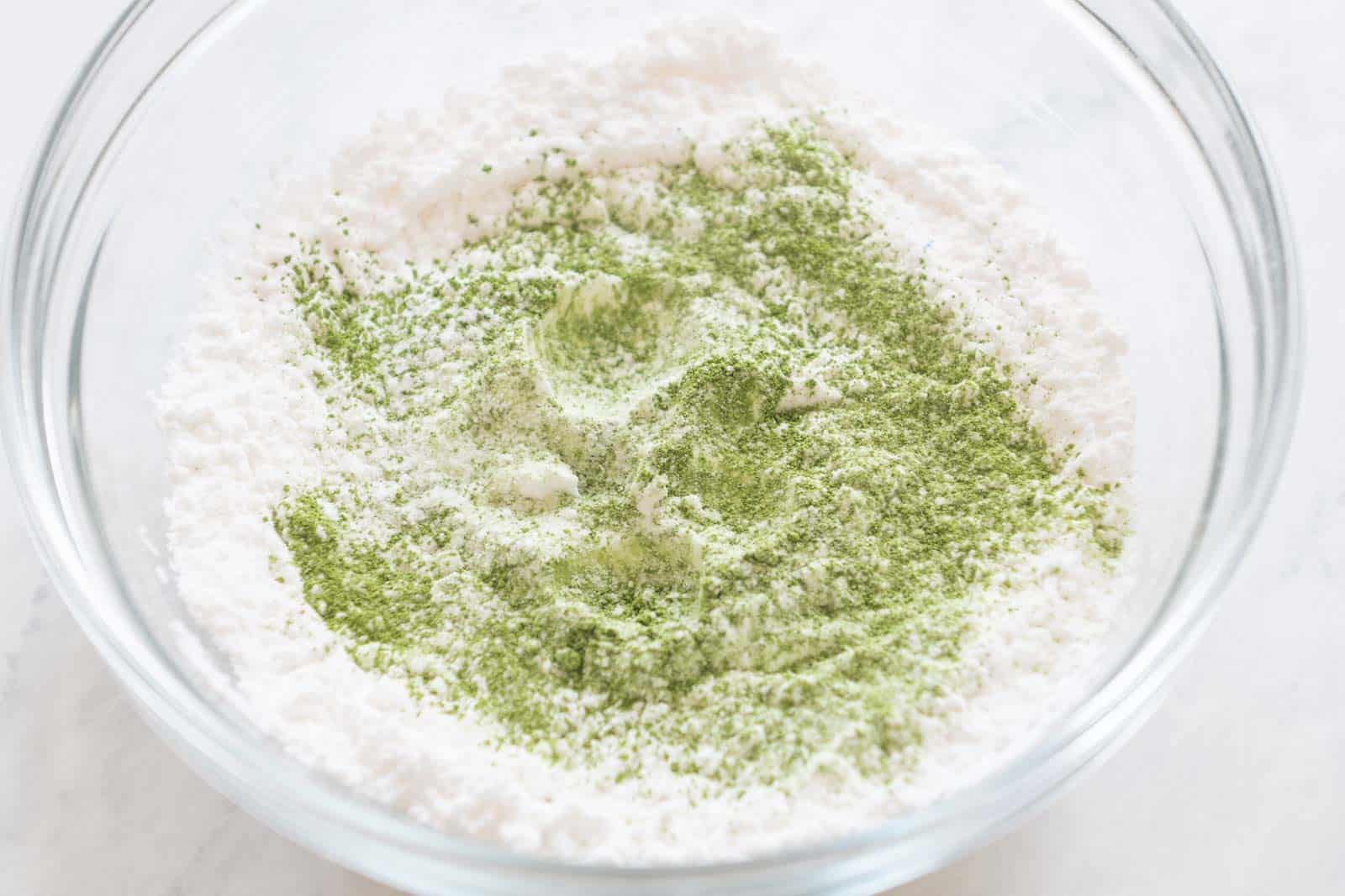 Matcha powder sifted over starches